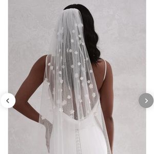 Made with Love ivory bridal veil with flower detail!